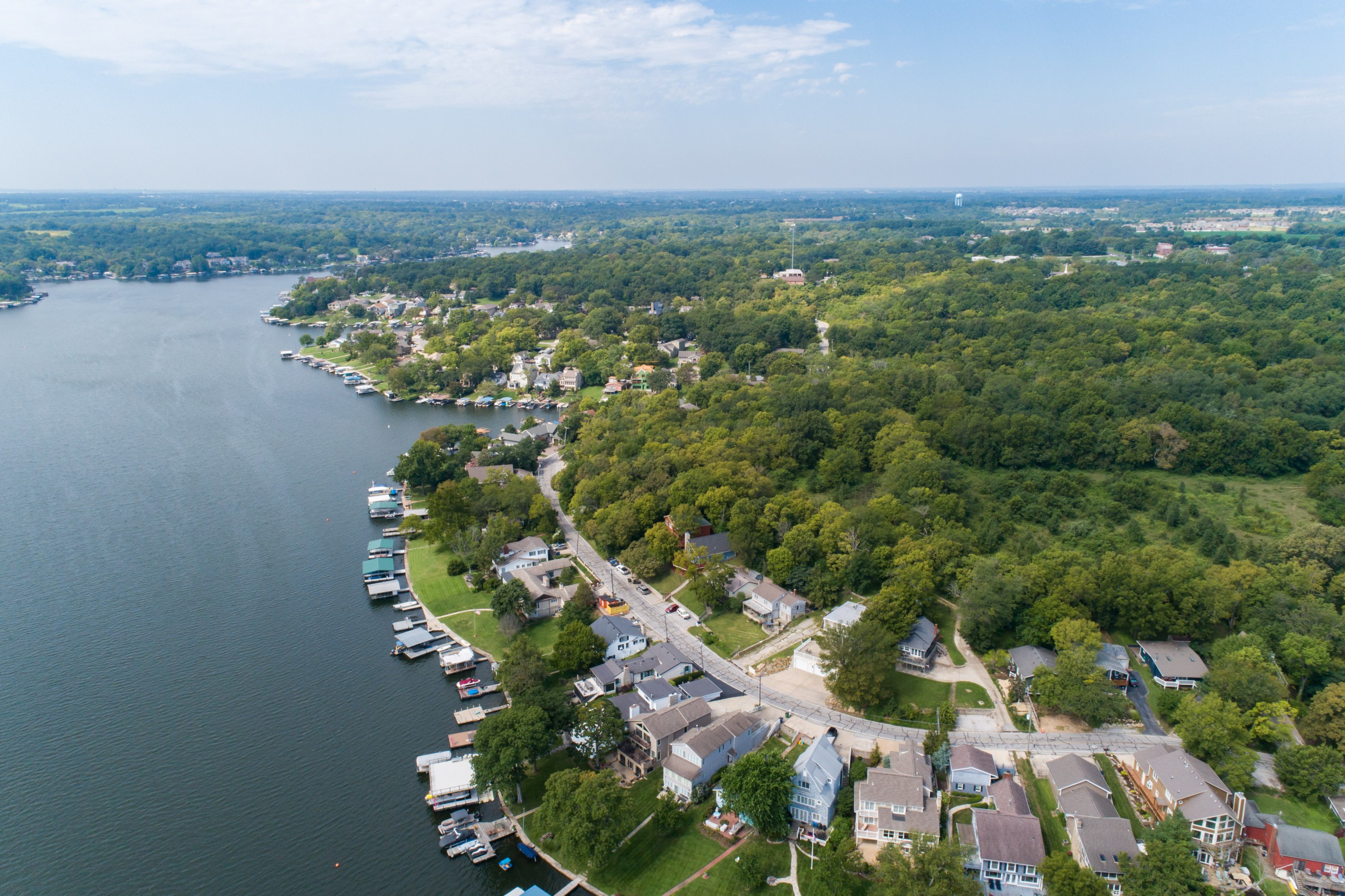 Aerial View of Lake with homes, docks and boats
